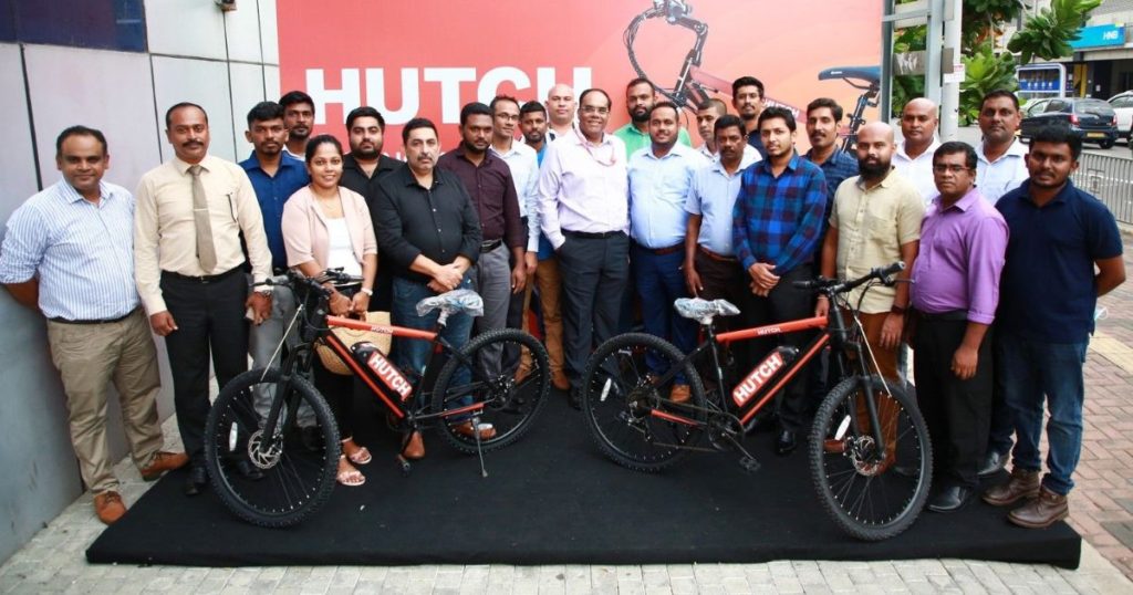 Hutch Sri Lanka team poses with two of its latest ebikes