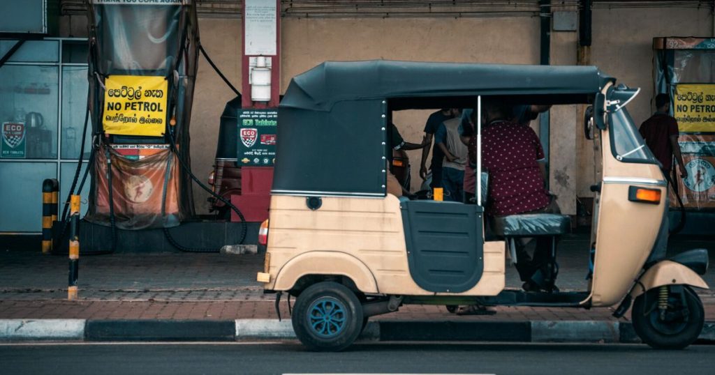 A tuktuk in a fuel queue | National Fuel Pass system gets two new features | CPC