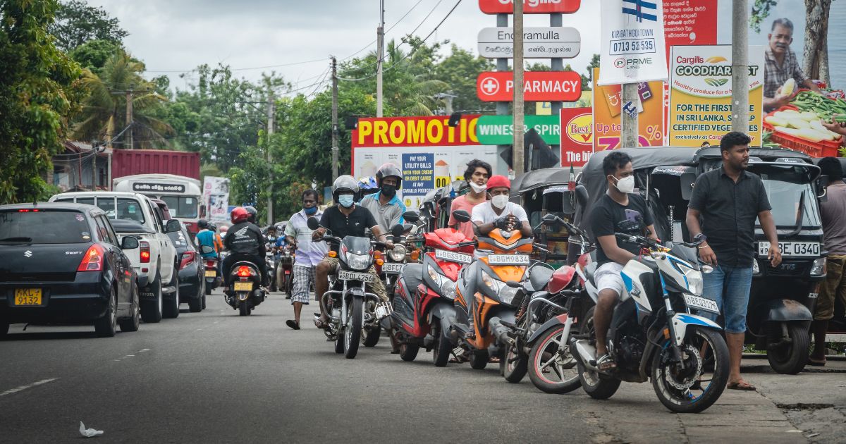 People in queue for petrol at fuel stations in Sri LankaIm