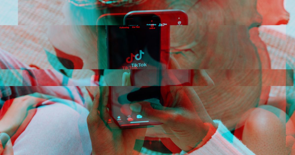 Designed feature image of user holding a phone with the TIkTok app on display