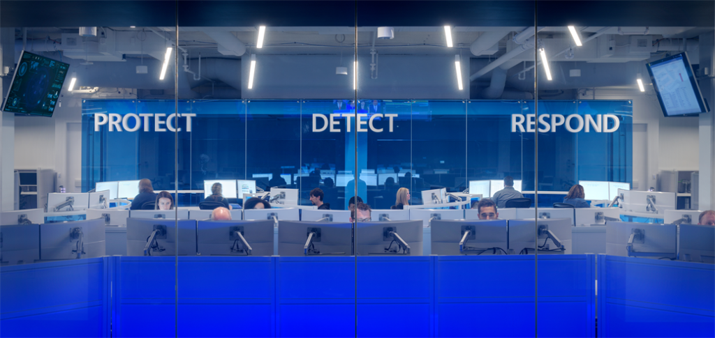 Image with text in the background that reads "protect", "detect", and "respond" | Microsoft Cyber Signals report