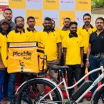 PickMe team posing with the Lumala team after partnership announcement